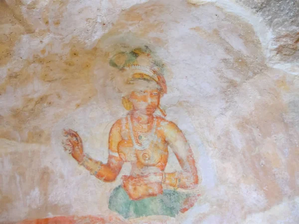 depositphotos_338664822-stock-photo-ancient-fresco-cave-temple-sigiriya